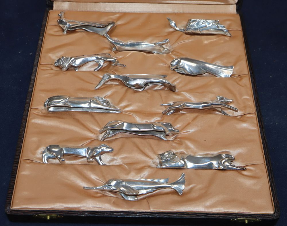 A cased set of twelve Gallia for Christofle Art Deco silver plated knife rests, designed by Edouard Marcel Sandoz